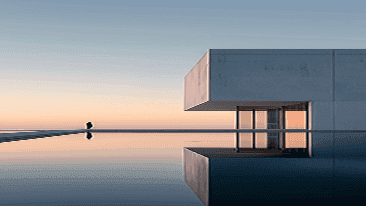 Minimal concrete home on the water